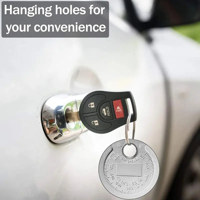 Coin Type Spark Plug Gauge Used As A Tool For Adjusting The Gap Between Automotive Spark Plugs