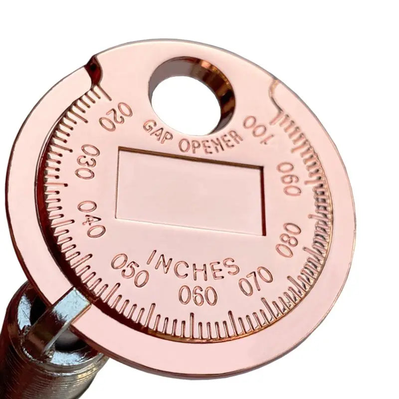Coin Type Spark Plug Gauge Used As A Tool For Adjusting The Gap Between Automotive Spark Plugs