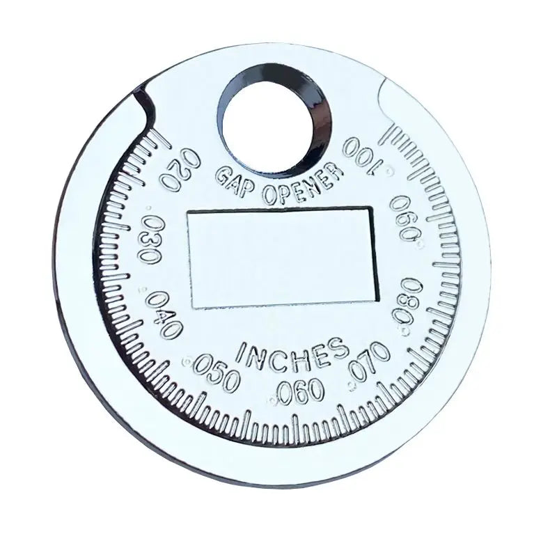 Coin Type Spark Plug Gauge Used As A Tool For Adjusting The Gap Between Automotive Spark Plugs